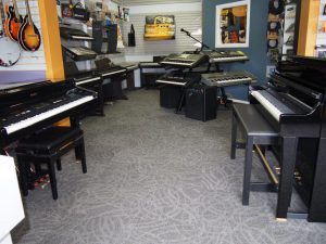 The pianos showing off the new carpet. (or is it the other way around?)
